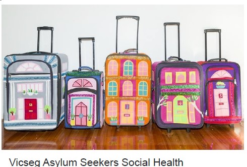 many designed in colors suitcases with handles up.