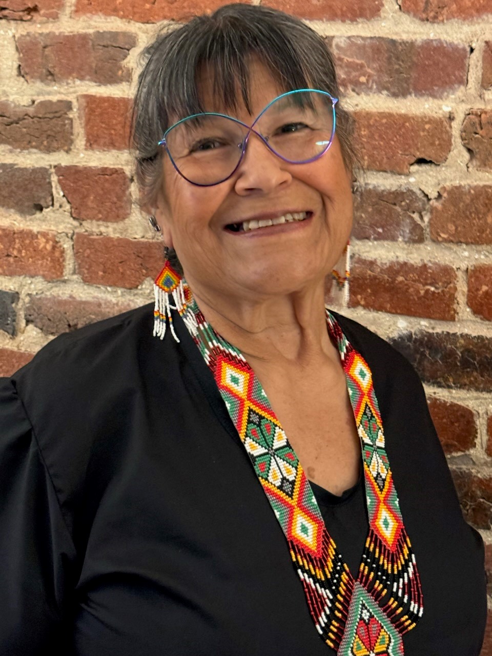 Headshot of woman smiling at the camera