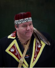 Man with Native-Tribal headband with black background