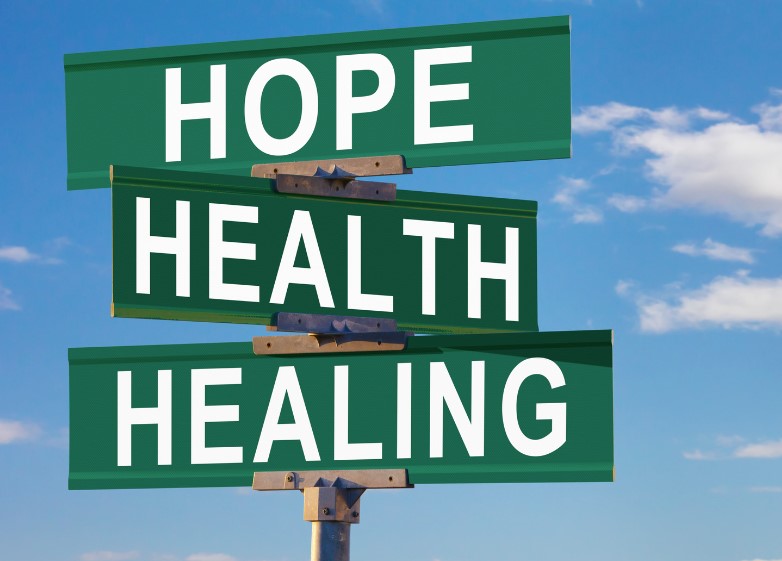 Road Signs that read Hope Health Healing