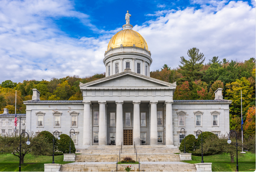 Vermont Statehouse Buidling with Golden Dome Roof and stairs leading to building with columns